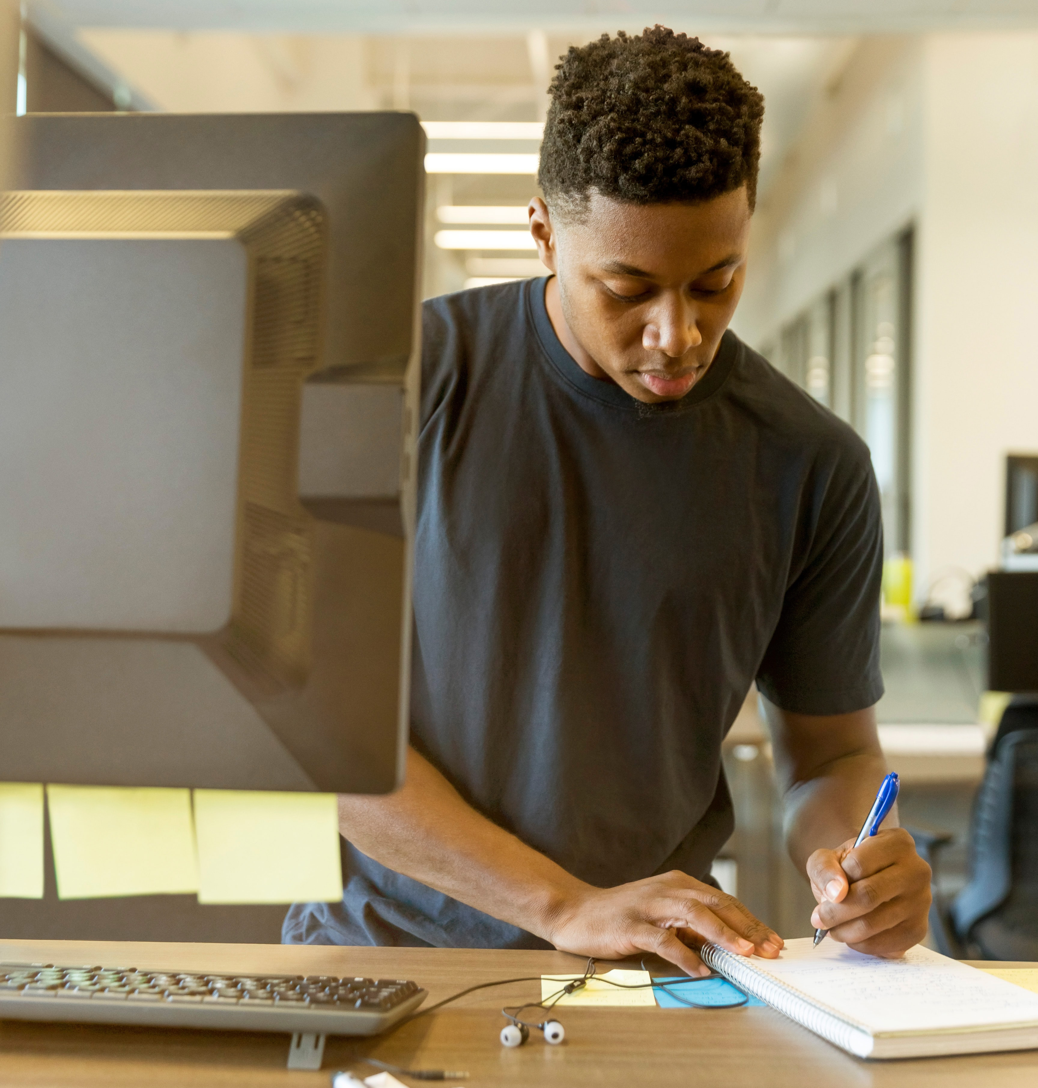 Student works at a desk